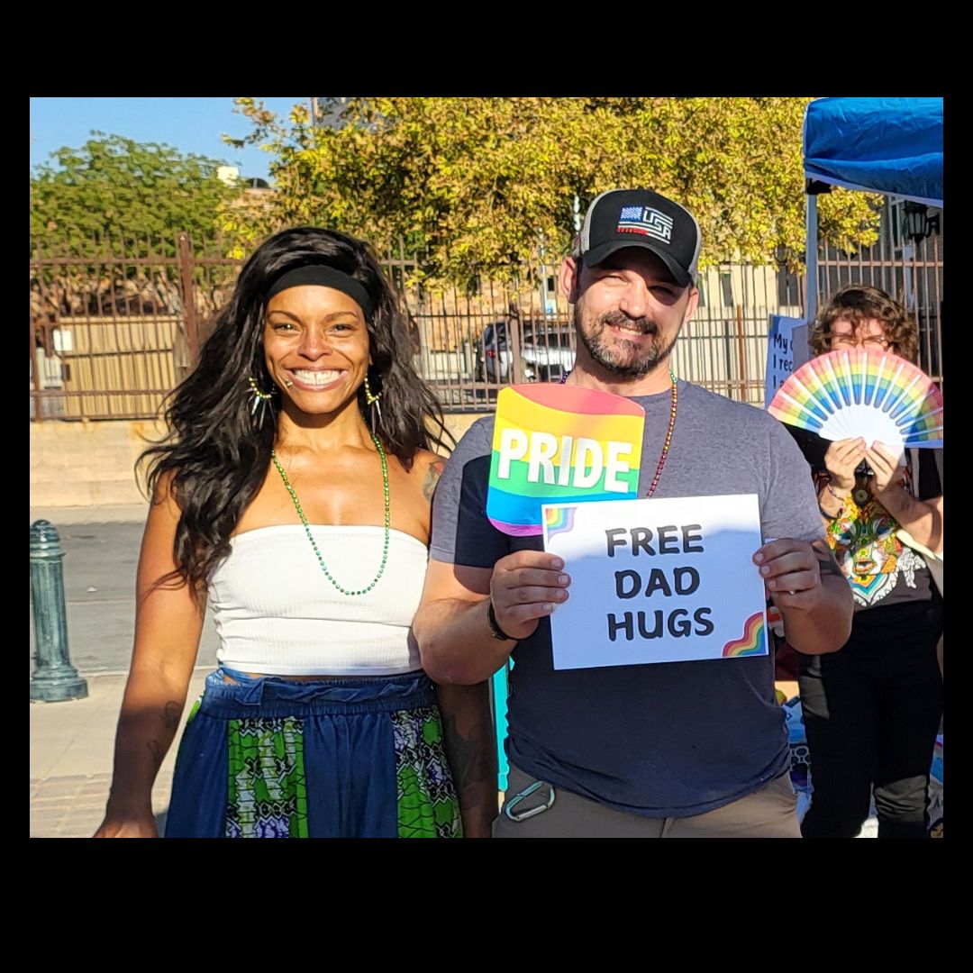 three people standing 